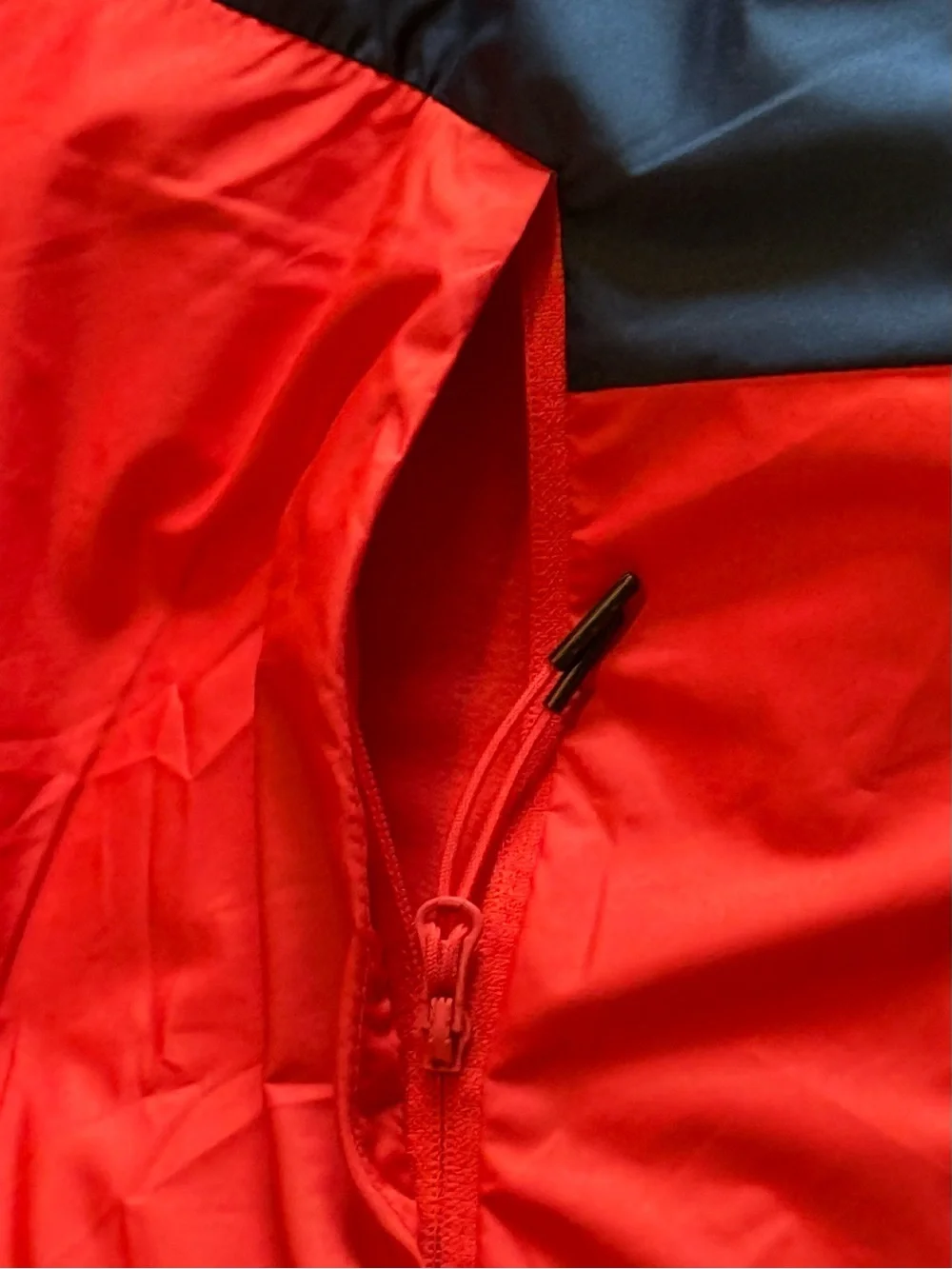 Nike Red Hooded Windbreaker with Black Chevron